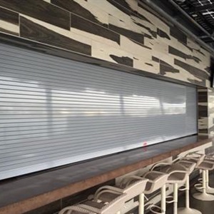 Close up side view of a counter shutter utilized in a restaurant 