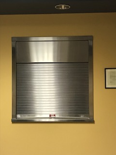 Rolling Counter Fire Shutter with Integral Frame and Sill