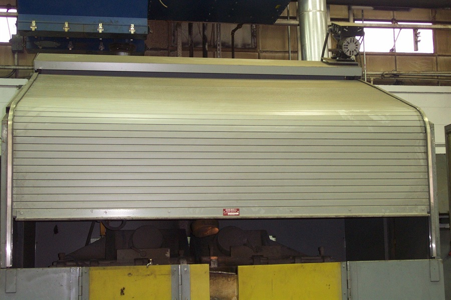 Photo of a rolling door acting as a machine guard 